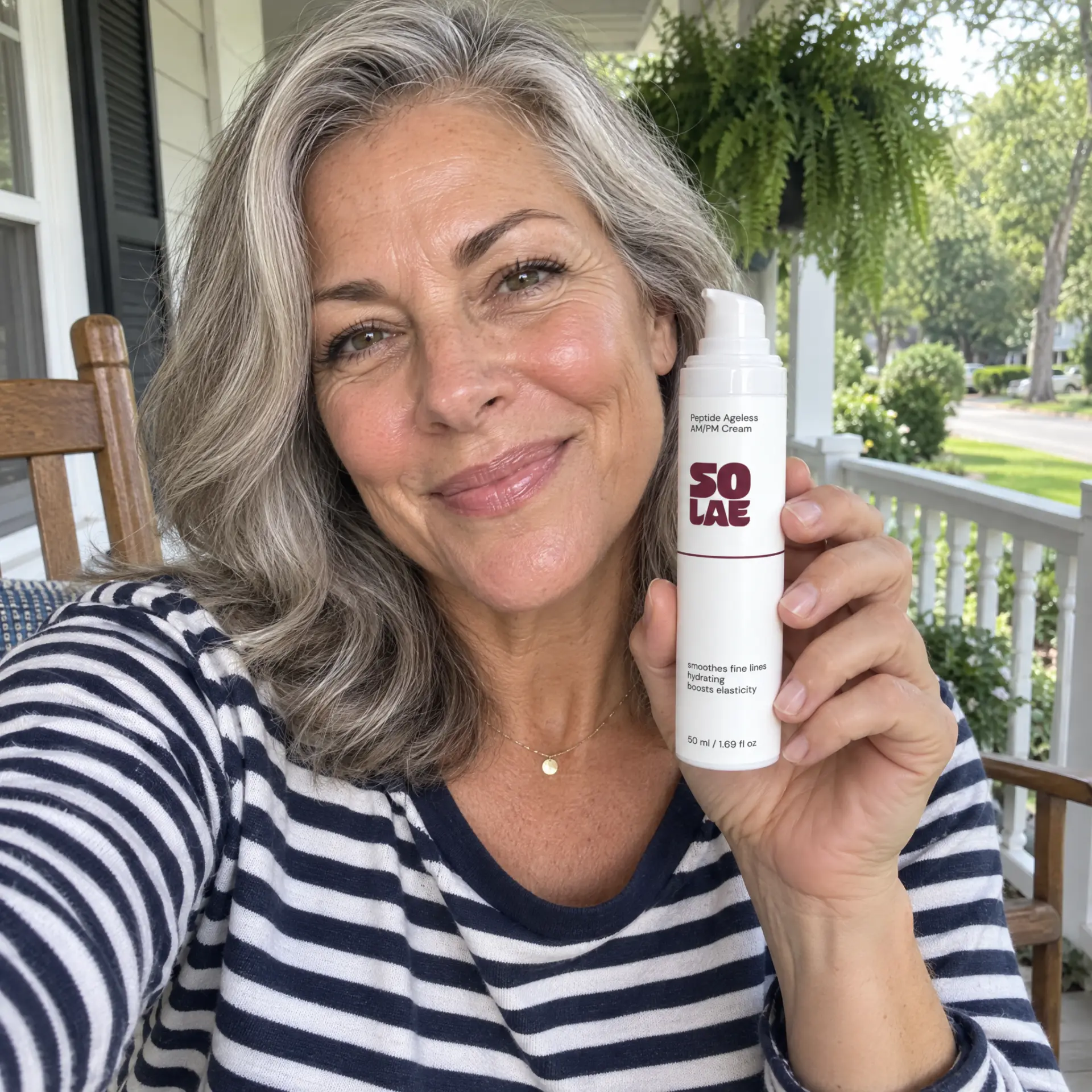A Solae customer holding her Peptide Ageless AM/PM Cream